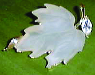 Circa 2000 eBay seller's photo of fabulously precious plastic leaf pin.